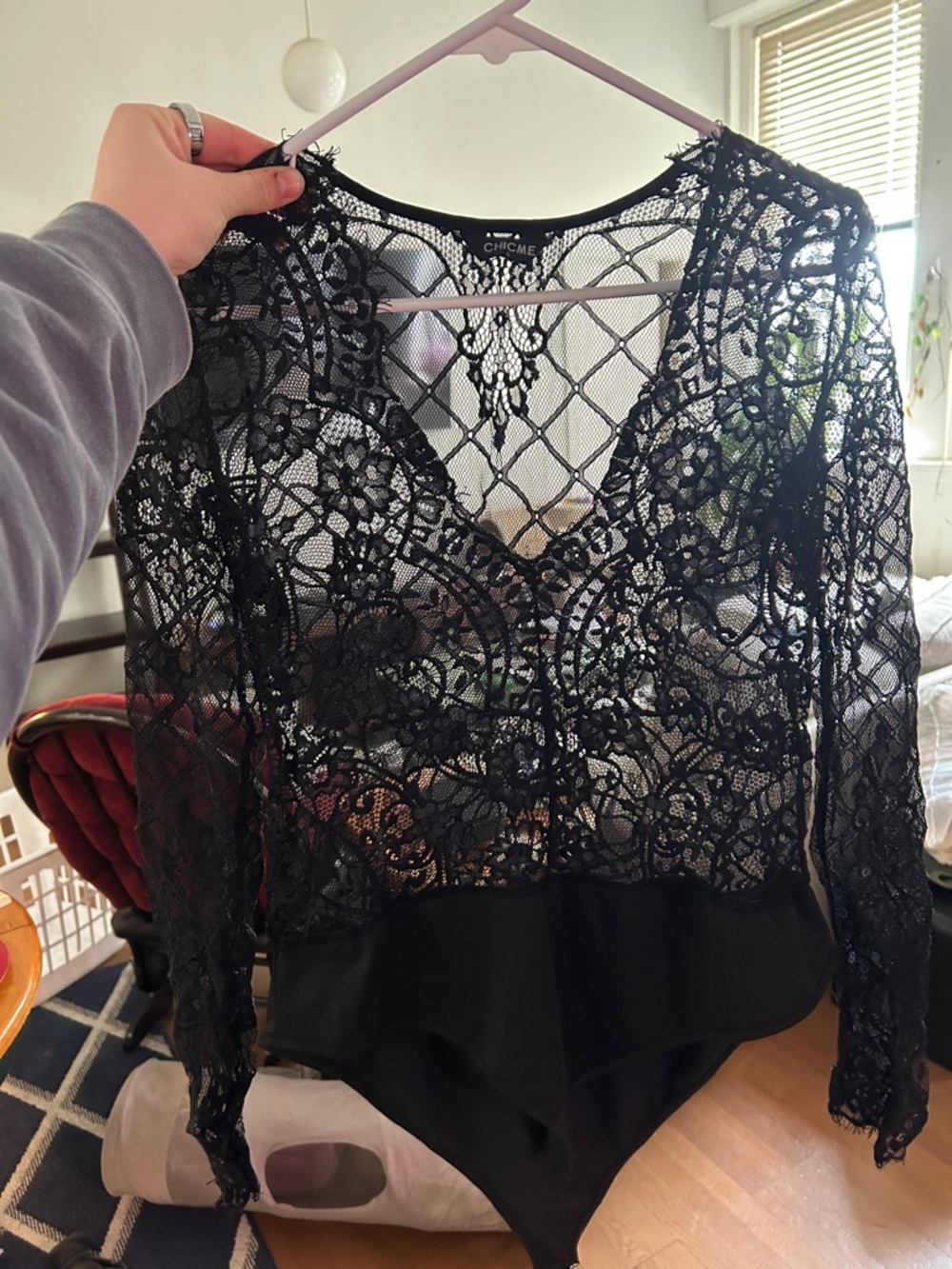 chic Black Sheer Lace Long-Sleeve Bodysuit